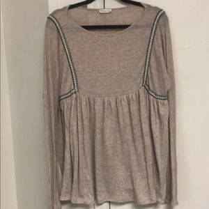 Tan flowy peplum top with detailing